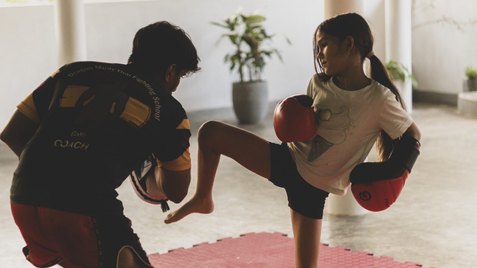 Muay Thai pad work training at Rama Shala